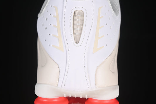 Nike Shox R4
	•	Upper Colors: White and beige with perforated